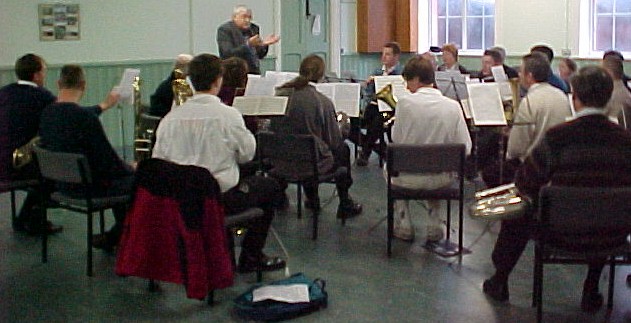 Ted Praying Poole 2000.JPG - 62570 Bytes
